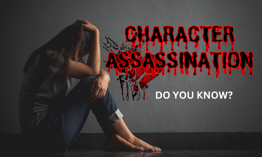 Character Assassination picture showing and depressed woman and a text boldly written in black and red with a bloody font type